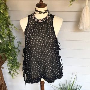 Black pattern tank from Free People😍🌚